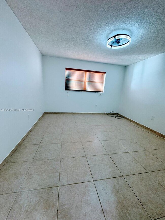 Building Photo - 8110 Sunrise Lakes Blvd