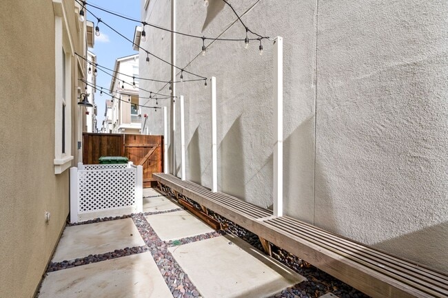 Building Photo - Sun-Filled Corner 4BR w/ Dual Yards & Panoramic Indoor-Outdoor Flow