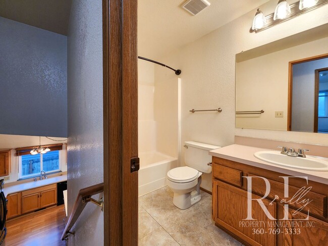 Building Photo - Spacious Silverdale Tri-Level with Hot Tub & Stylish Kitchen