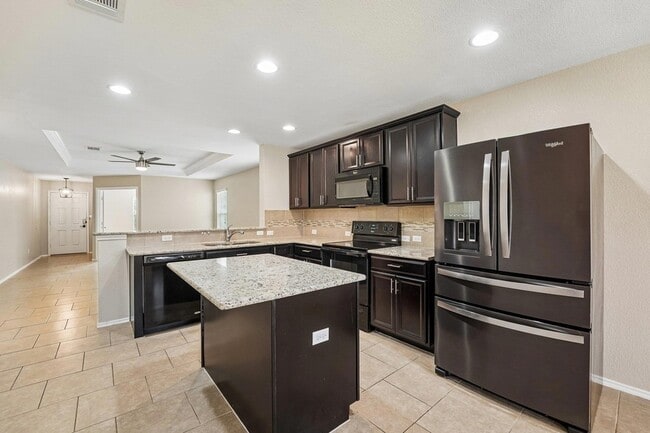 Building Photo - 9209 Bowfield Dr