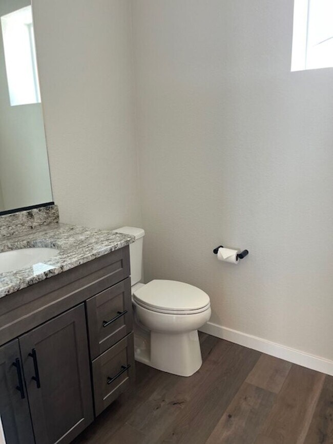 Building Photo - MODERN THREE STORY TOWNHOME WITH 2 CAR GAR...