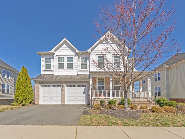 Building Photo - This home offers an open floor plan with s...