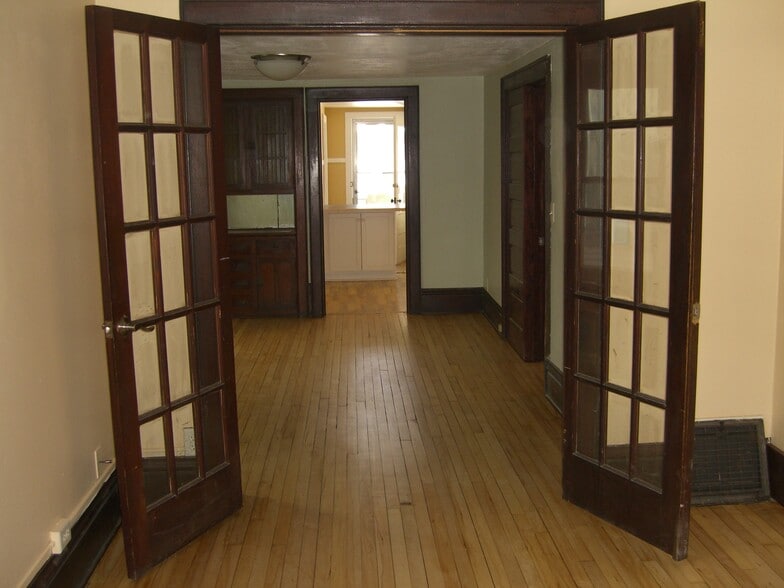 Dining room with historic China cabinet - 945 E Johnson St