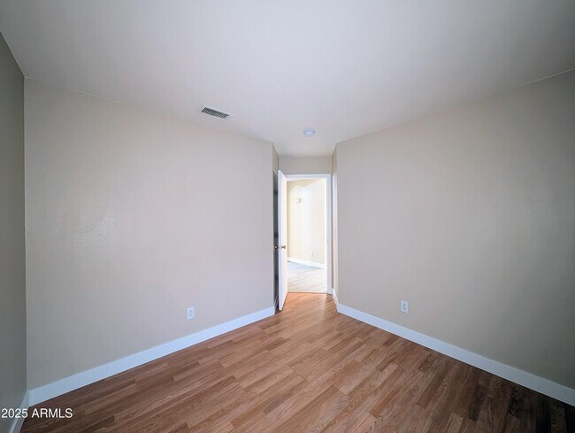 Building Photo - 7059 W Gardenia Ave