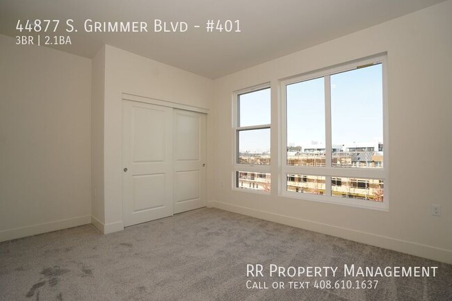 Building Photo - Brand New Top Floor Condo in Excellent Fre...