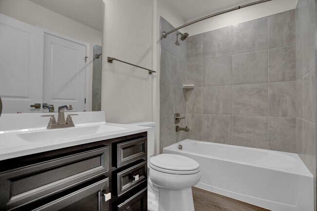 Building Photo - Luxury 4-Story Townhome with Rooftop Terrace!