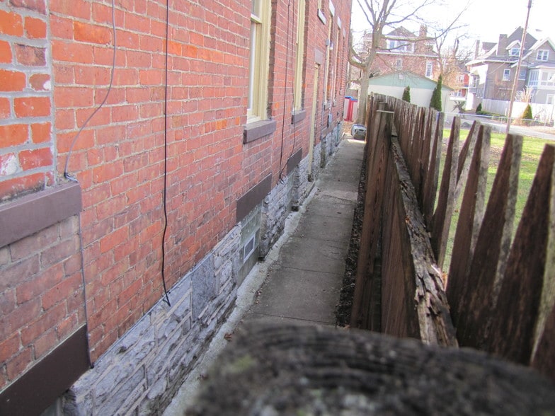 Fenced walkway to backyard - 49 N 20th St
