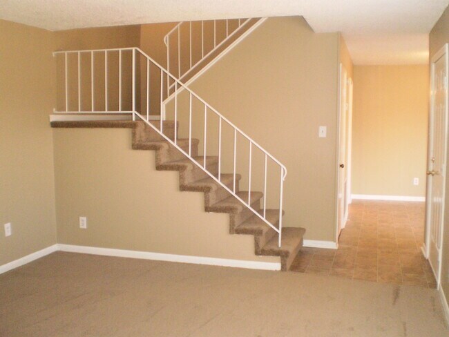 Building Photo - NICE--2 Bedroom 1.5 Bath Townhouse WEST of...