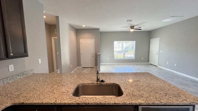 Building Photo - Beautiful 3 Bedroom Palm Bay Home with Upgrades & No Water Bill!