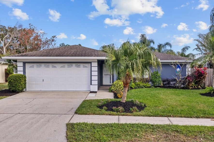 Updated exterior with fresh paint, well-maintained landscaping, and a welcoming vibe. - 1932 Brainerd Ct