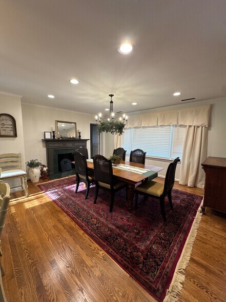 dining room with Fireplace - 3912 Faculty Dr