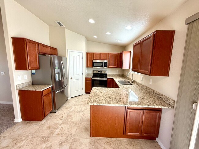 Building Photo - Great 4 Bedroom Home with Drive Through Side Gate! *HOME IS CURRENTLY OCCUPIED, PLEASE DO NOT DIS...