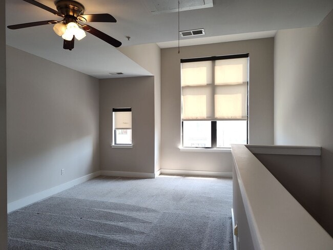 Building Photo - Modern townhome located in the M Complex c...