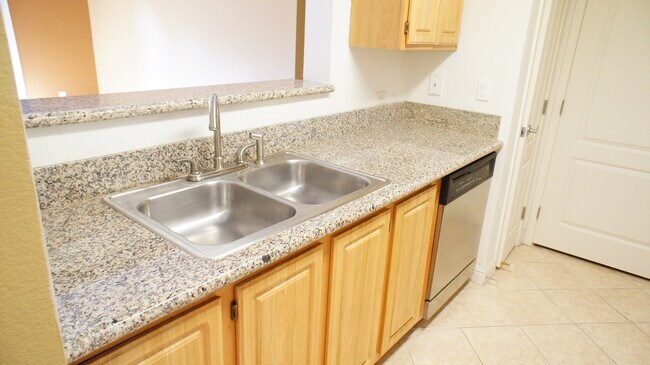 Building Photo - Stylish 1-Bedroom Condo with Community Amenities in Tuscan Villas