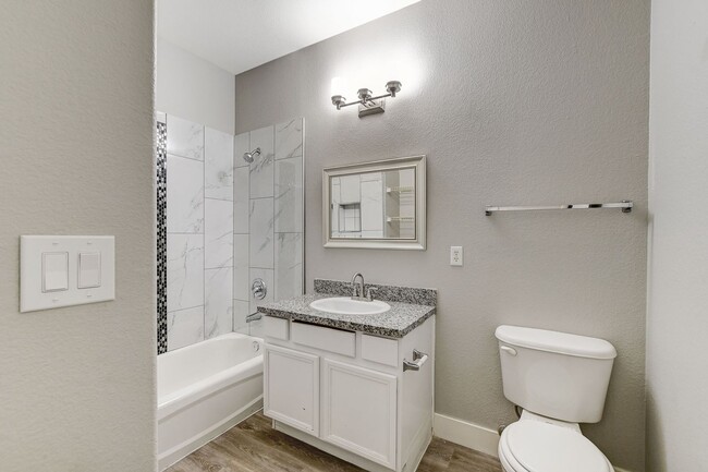Building Photo - Upgrated upstairs 2 Bedrm 2 bath Gated Com...