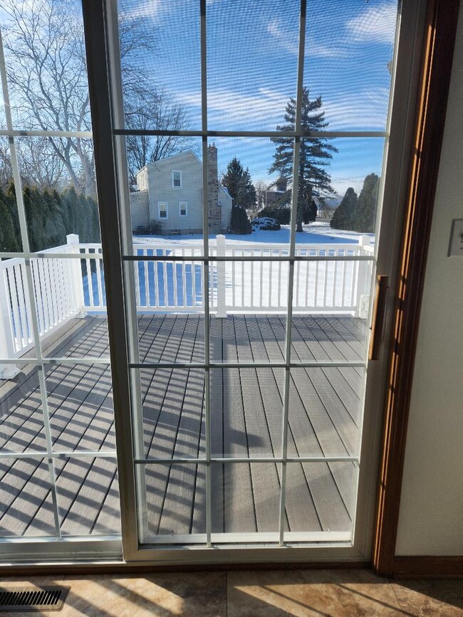 New trex composite decking with railings. - 6568 Ward Rd