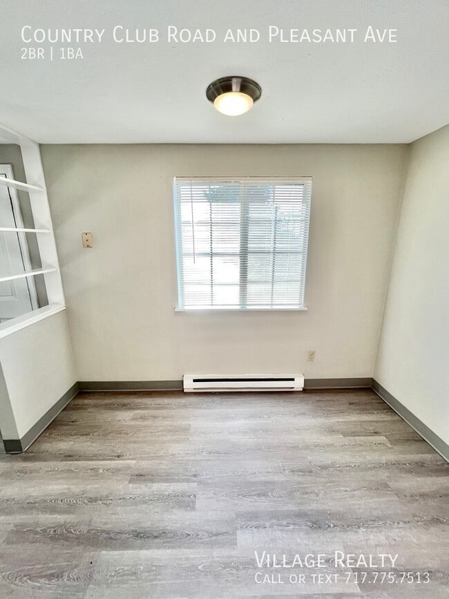 Building Photo - 605 Country Club Rd