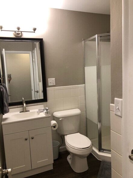 Bathroom off of hallway with walk-in shower - 1534 E Broadway St