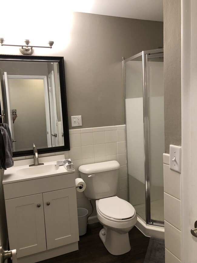 Bathroom off of hallway with walk-in shower - 1534 E Broadway St