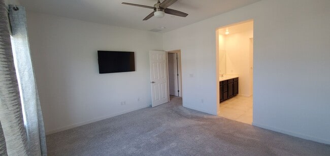 Building Photo - Beautiful townhome features a bright, open-concept layout