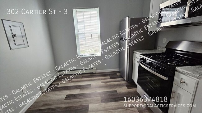 Building Photo - 302 Cartier St
