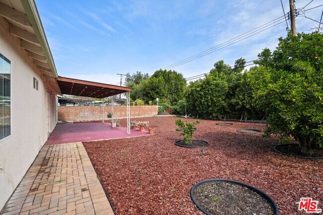 Building Photo - 6558 Neddy Ave