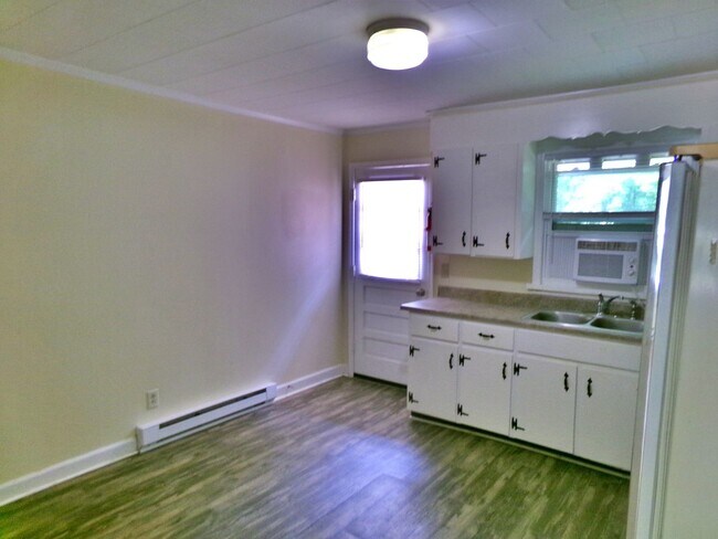 Building Photo - Southern Roots Apartments