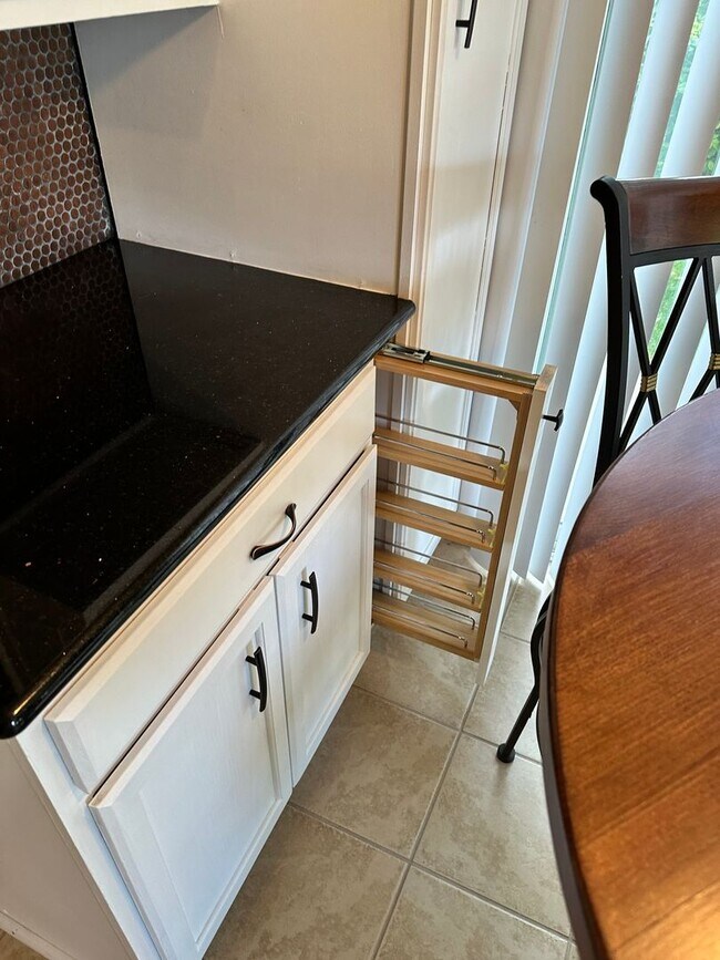 Building Photo - 3 Bedroom 2 Bath Townhome with Gas Fireplace, community pool, lots of storage