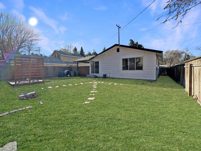 Building Photo - 3-Bedroom Boise Home with Outdoor Fireplace, Fenced Yard & LVP Flooring Near Downtown | $500 Off ...