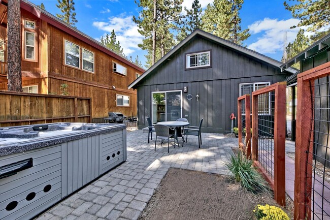 Backyard with hot tub, BBQ and dining table (in-law unit next door not included) - 1139 Craig Ave