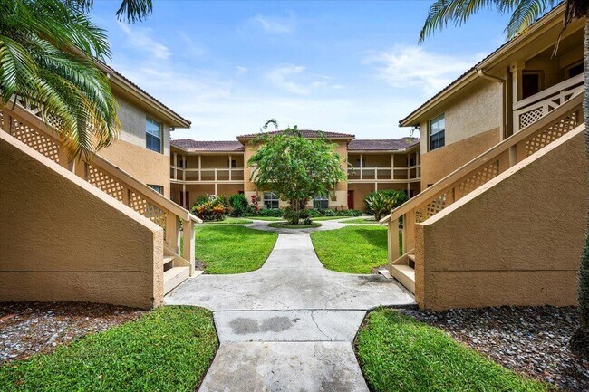 Building Photo - 4887 Via Palm Lakes Via