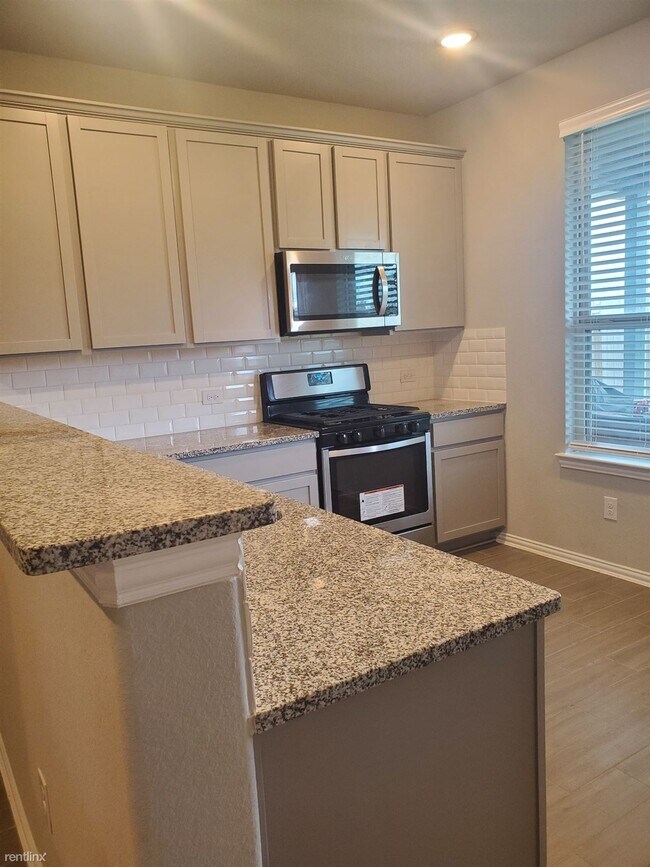 Building Photo - 4 br, 3 bath House - 7442 French Quarter Ct