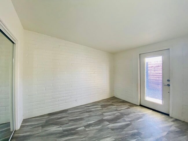 Building Photo - 1/2 Off First Full Month's Rent! Spacious Design Meets Modern Living in this Private 2 bedroom 1 ...