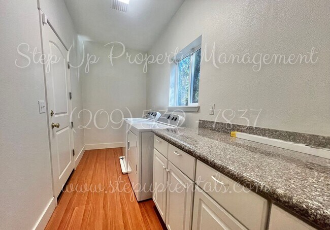 Building Photo - Updated 2BR/2BA Home | Generator • Fenced Yard • EV Charging