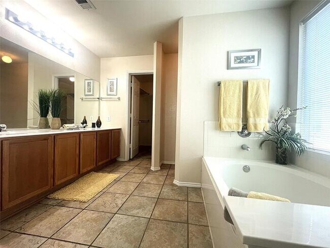 Building Photo - Plank Floors & Modern Comforts!" "Corner Fireplace, Split Bedrooms & a Master Retreat You’ll Love!"