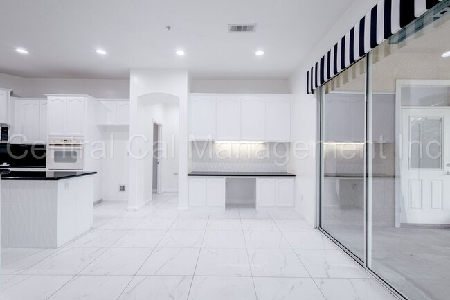 Building Photo - 4 Bedroom/3 Bath Home with Paid Solar - $3295 Per Month!