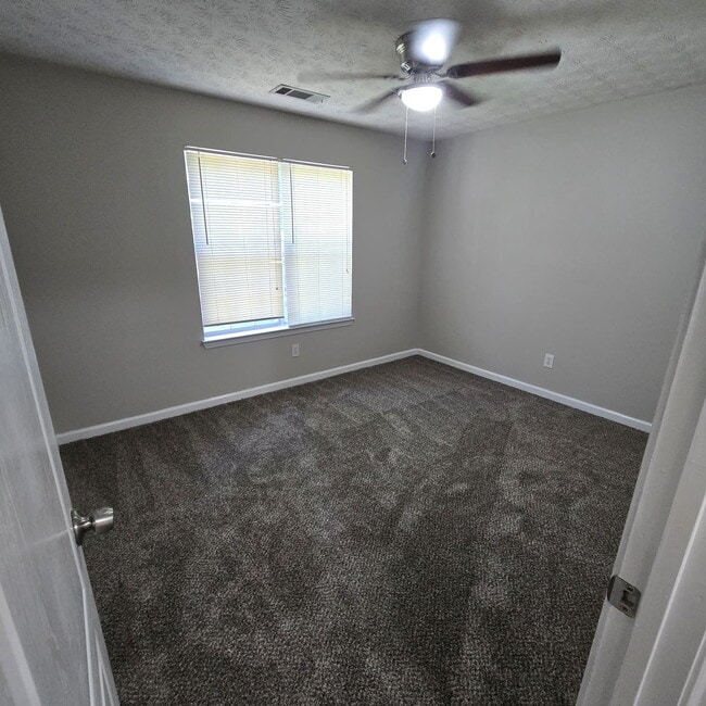 Building Photo - "Charming 4-Bed Oasis with Granite Countertops on Pebble Creek Drive, McDonough!"