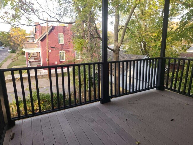 Building Photo - Charming & Spacious Updated Brick Home – P...