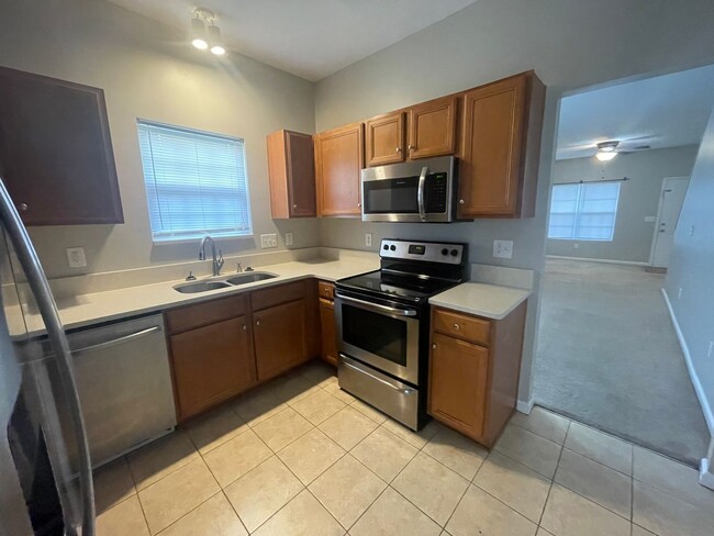 Building Photo - This two-story, 4-bedroom, 2-bath duplex in Fort Mill, SC sits on a corner lot