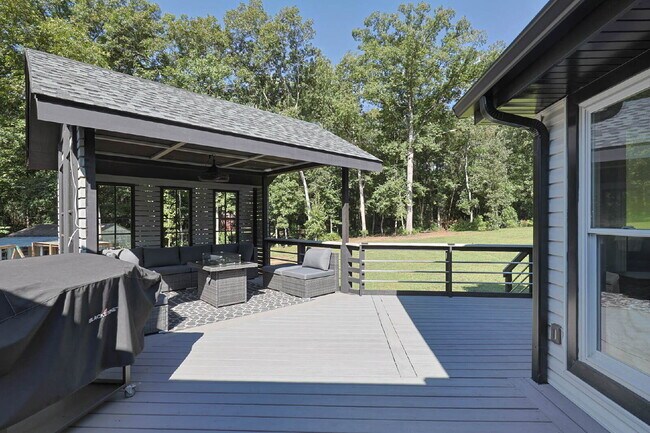 Building Photo - COMING SOON · Designer Renovation · Covered Deck Pavilion · 2-Car Garage · Lawn Care Included