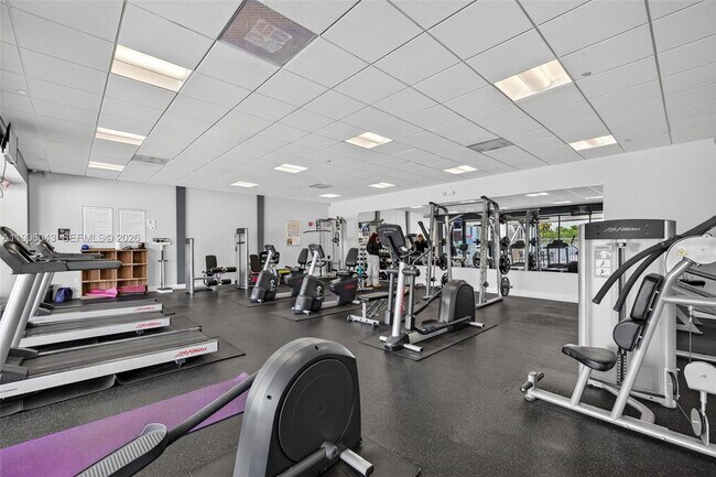 Building Photo - 3675 N Country Club Dr