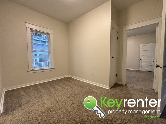 Building Photo - Newly Remodeled 2-Bedroom, 2-Bath Tacoma Home with Finished Basement, Large Backyard, and Detache...