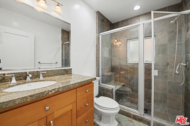 Building Photo - 10543 Almayo Ave