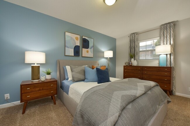 Cozy bedroom with carpet and overhead lighting - The Preserve at Crestwood