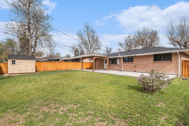 Building Photo - Updated Five-Bedroom Brick Ranch in the He...