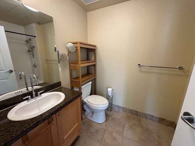Building Photo - Modern 1-Bedroom Condo in the historic Gar...