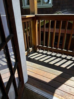 Entry, porch at top of exterior stairway - 2615 Parker St