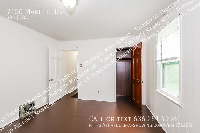 Building Photo - 7150 Manette Dr
