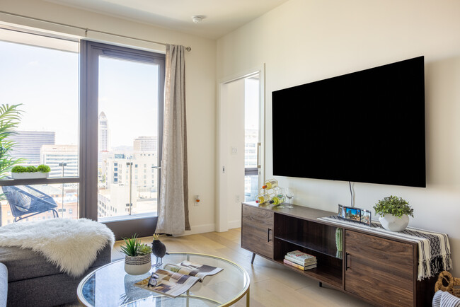 Enjoy Netflix on a 70'' Smart TV in unit. Make Your Very Own Private Theater! - 400 S Broadway