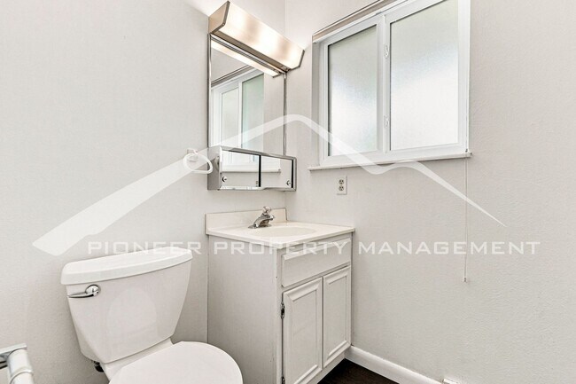Building Photo - Spacious Home with Central AC and Traditional Wood Features
